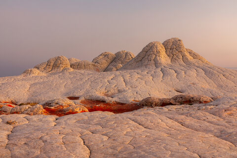 View of rock formations in White Pocket in Arizona at sunrise.