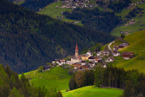 View from above on a small village in the Dolomites in Italy.