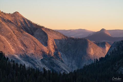 Golden light over the peaks in Yosemite National Park.