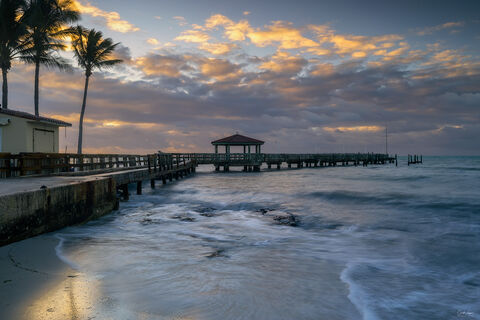 View of the pier at John & Mary Spottswood Waterfront Park in Key West in Florida at sunrise.