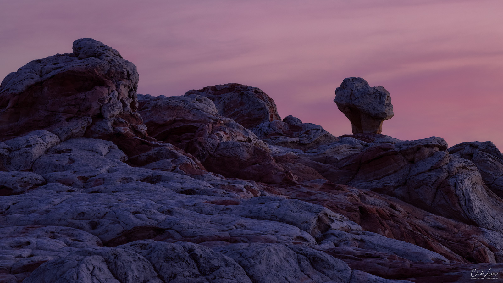 View of rock formations in White Pocket in Arizona at sunset.