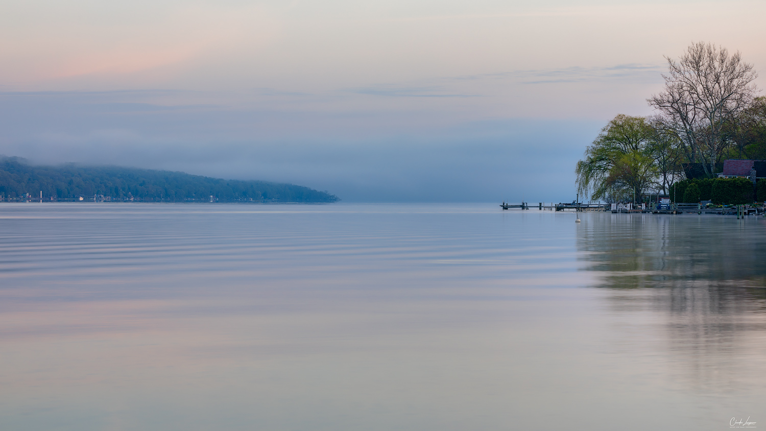 View of Cayuga Lake at sunrise in Ithaca in New York.