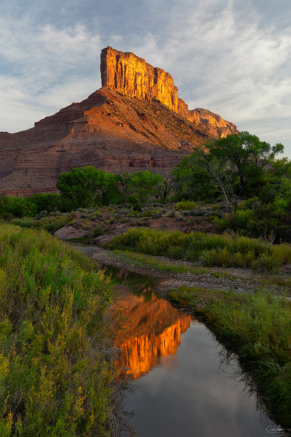 Reflection of Red Rock Formation in Gateway in Colorado at sunrise.