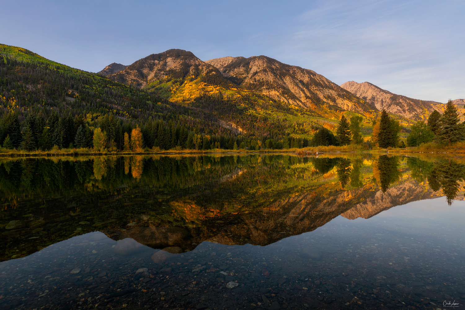 View of mountain reflection in Island Lake in Marble, Colorado.