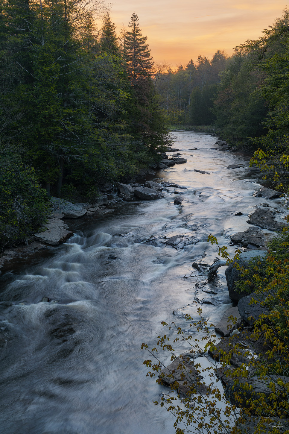 View of Blackwater River at Blackwater Falls State Park in West Virginia at sunrise.