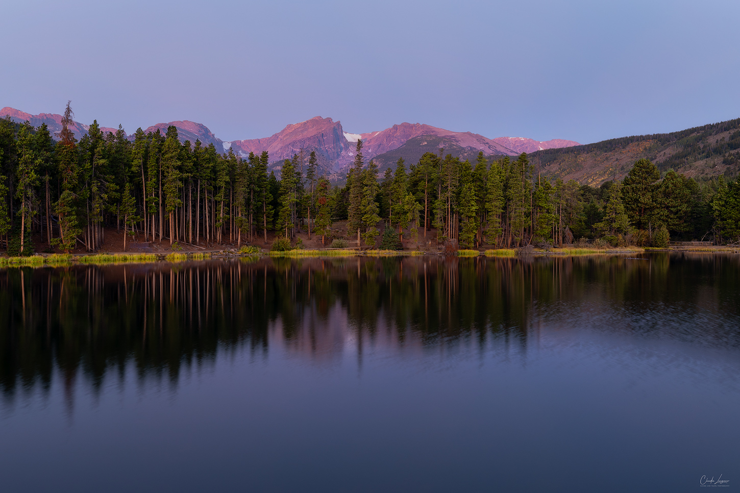 Reflection of the Continental Divide at Sprague Lake in Rocky Mountain National Park.