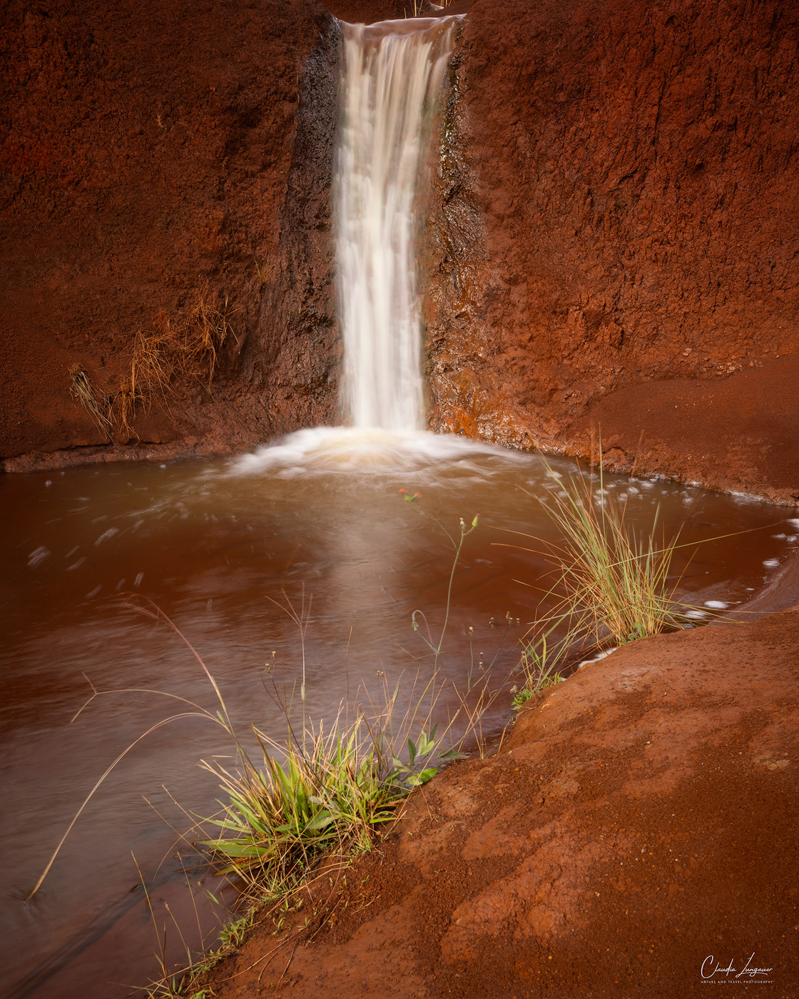 Red Dirt Waterfall in Waimea Canyon on Kauai Island in Hawaii.