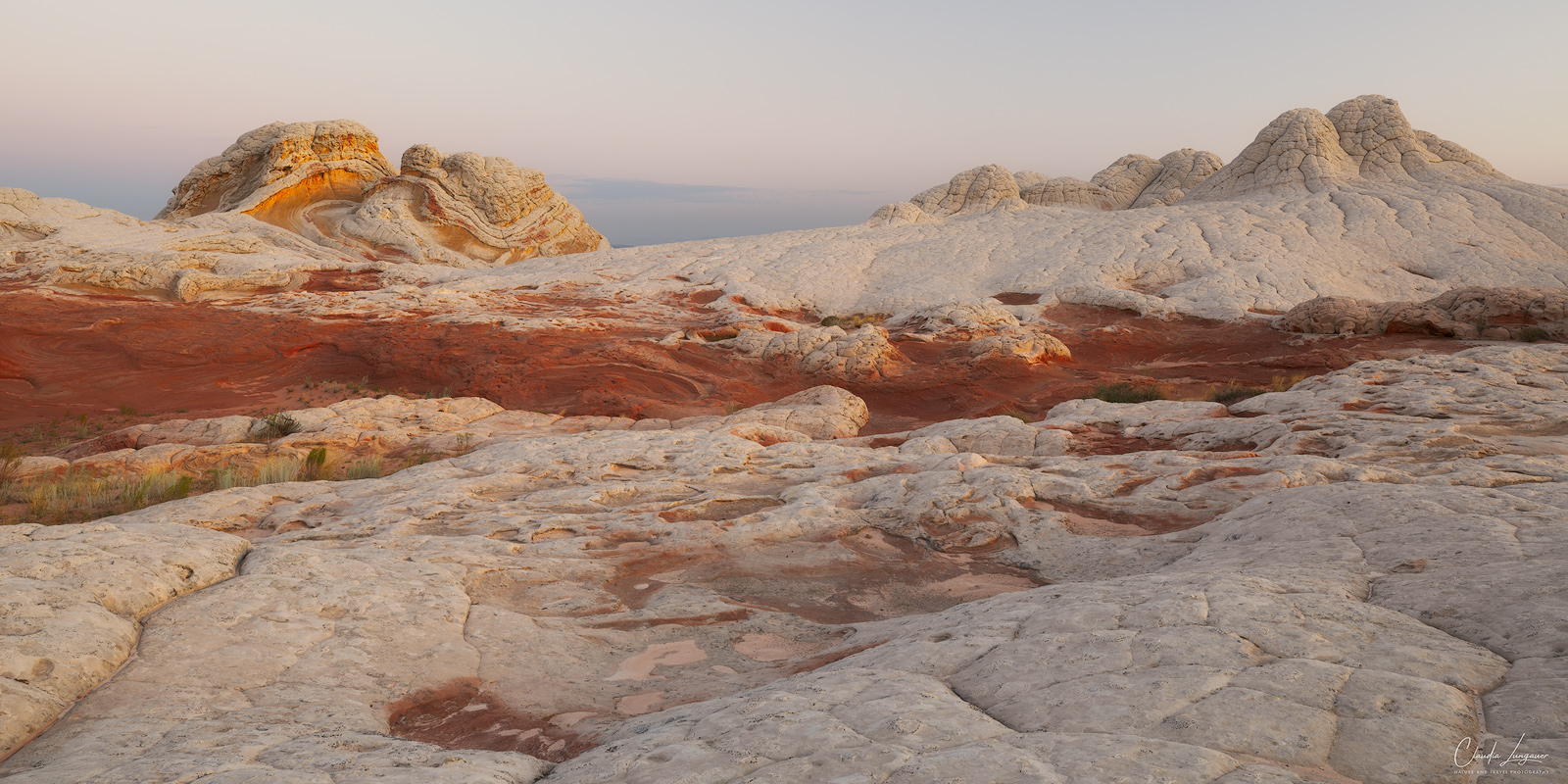 View of rock formations in White Pocket in Arizona at sunrise.