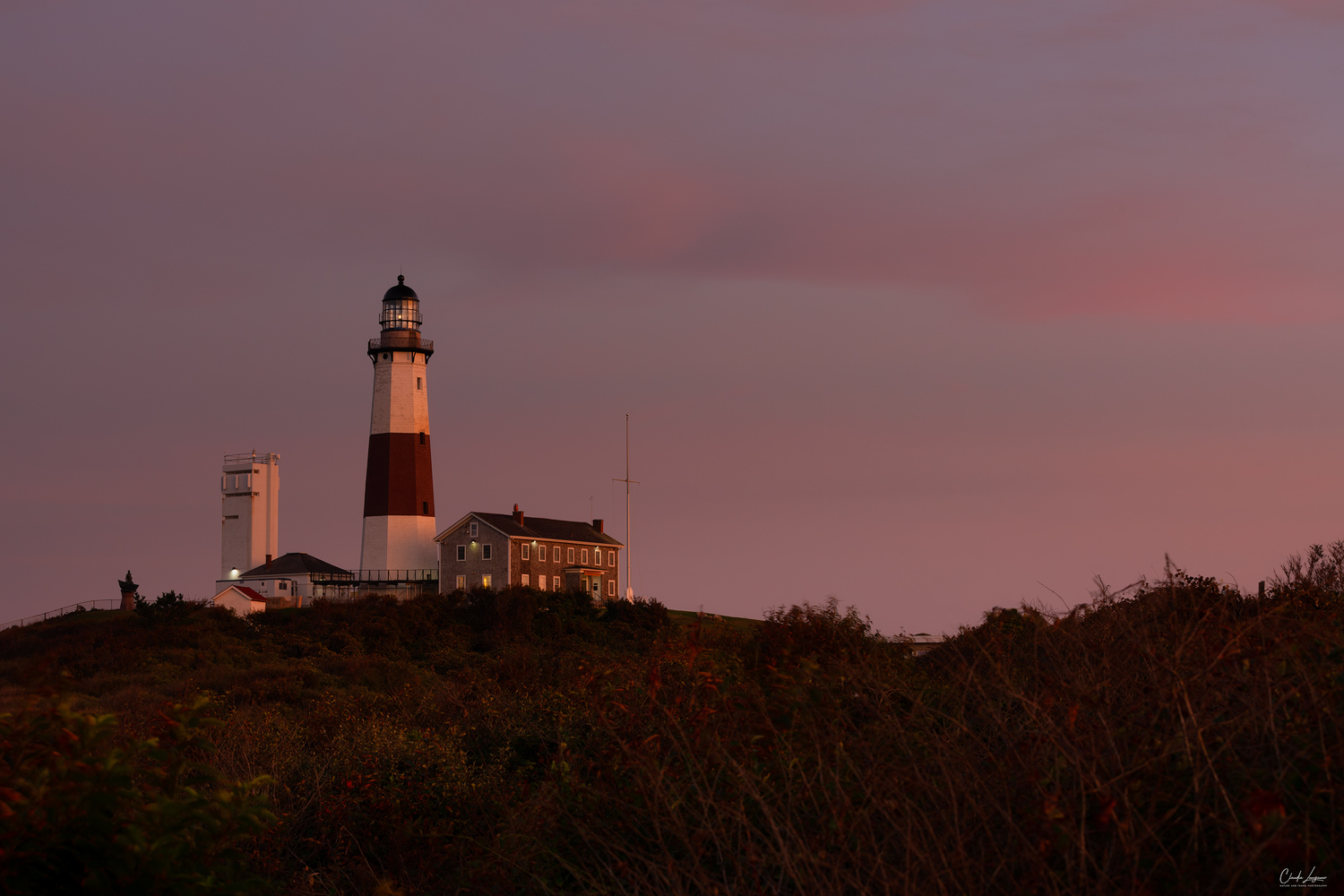 View of Montauk Point Lighthouse in New York at sunset.