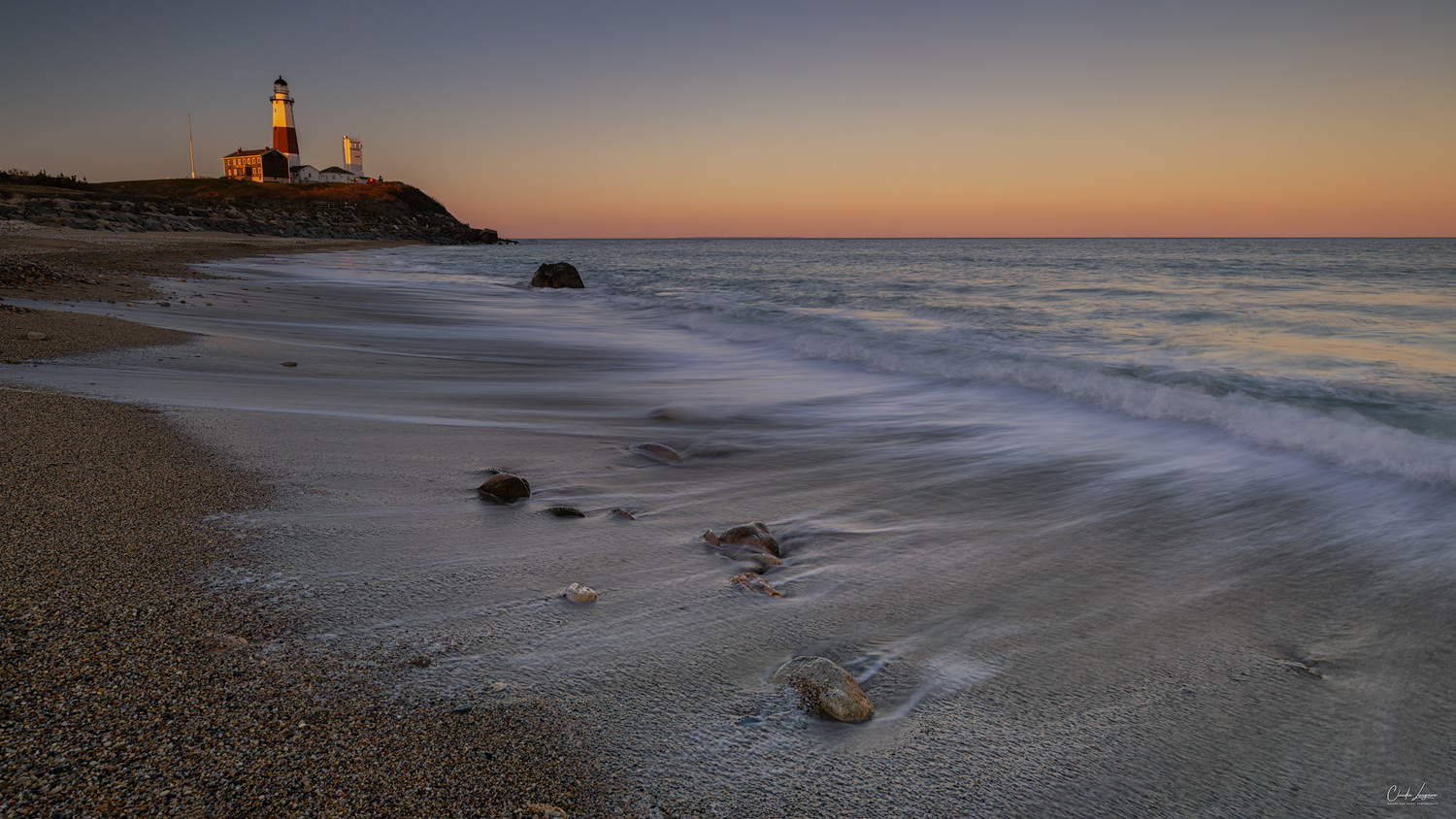 View of Montauk Point Lighthouse in Mountauk in New York at sunset.