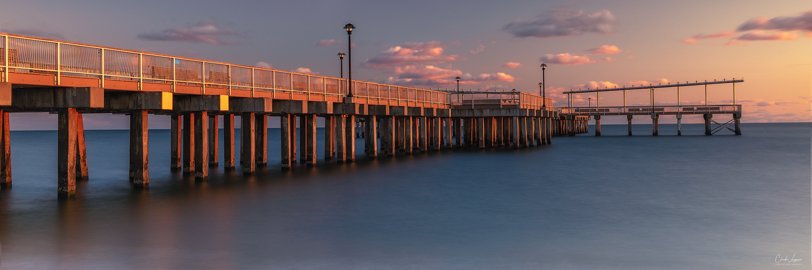 View of Steeplechase Pier at Brighton Beach in New York City at sunset.