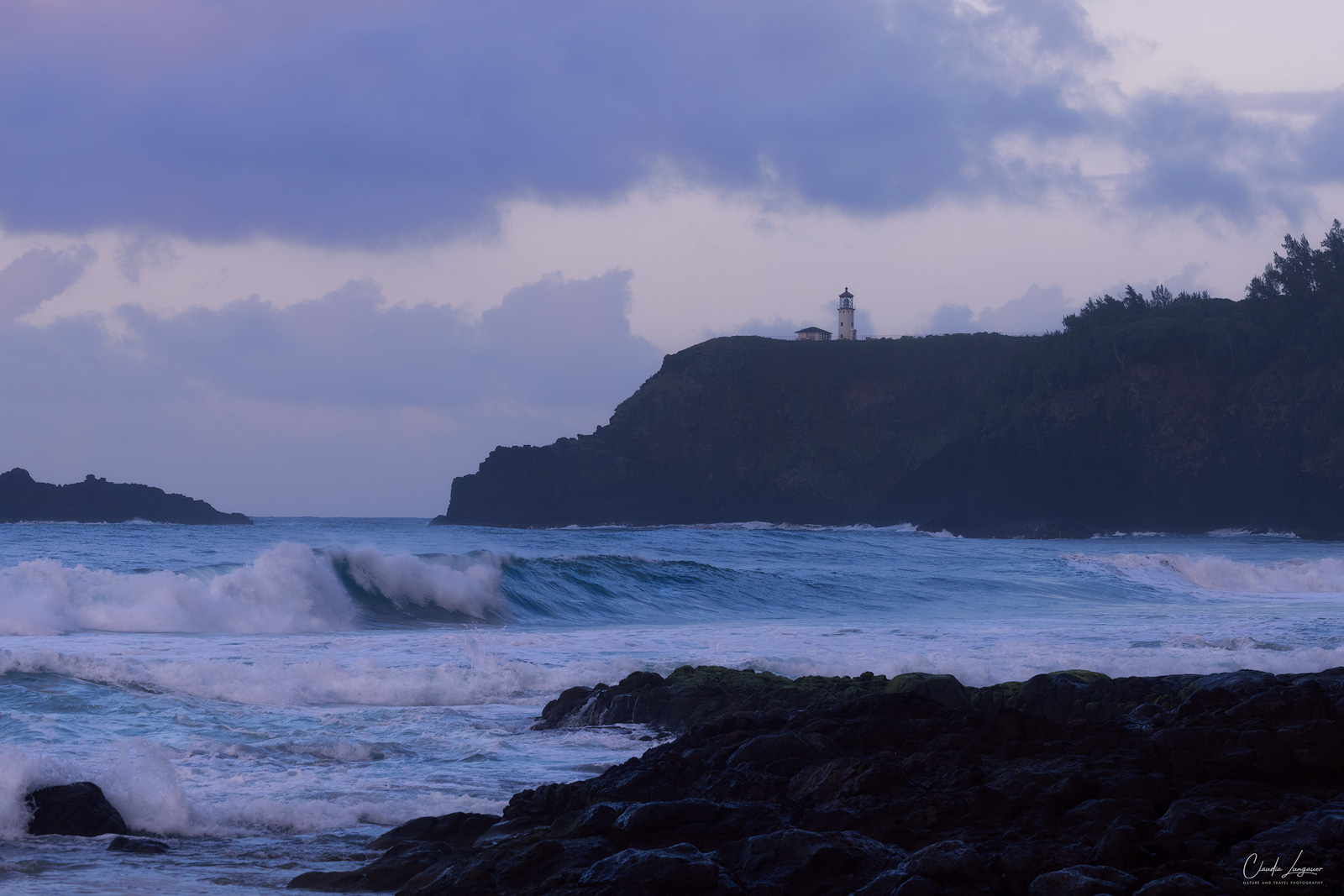 Big waves at Secret Beach on the north shore of Kauai island in Hawaii.